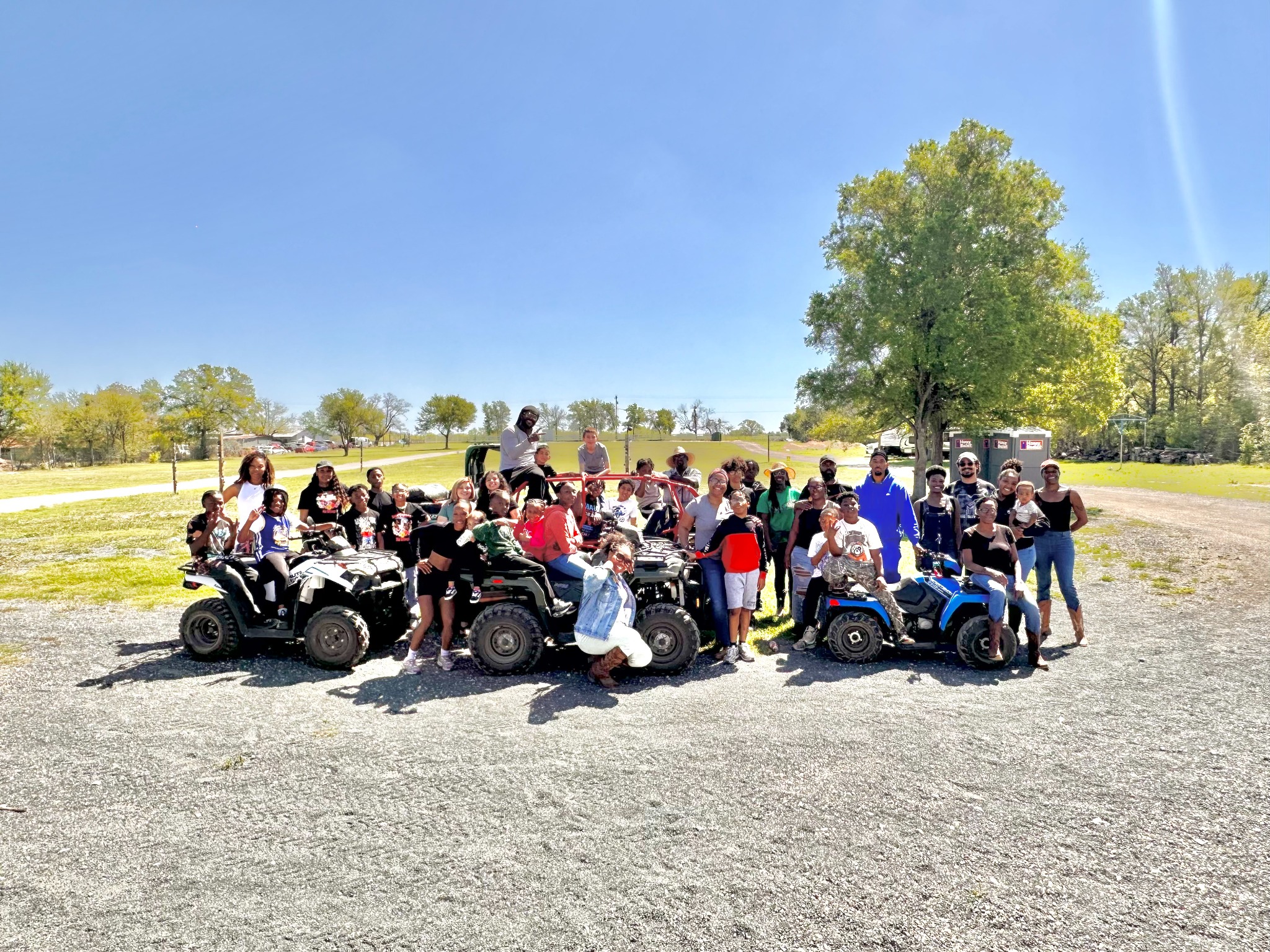 Families and children gathering outdoors at the ranch